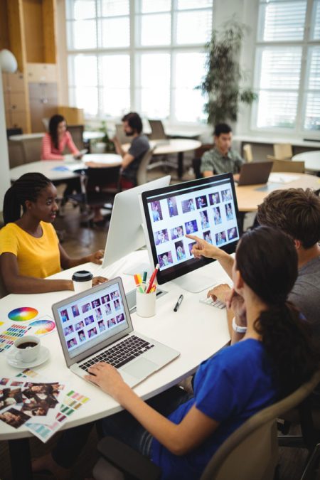 baja-graphic-designers-working-at-their-desk